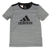 Čierno-biele pruhované športové funkčné tričko s logom Adidas