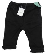 Nové - čierne skinny rifle zn. Next