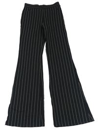 Čierno-biele pruhované flare legíny zn. H&M