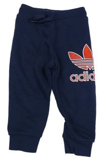 Tmavomodré tepláky s logem Adidas