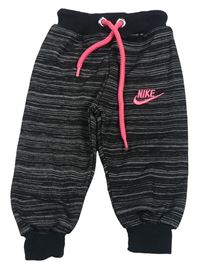 Čierno-sivé melírované tepláky s logom Nike