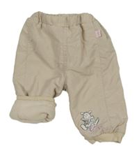 Světlebéžové šusťákové podšité kalhoty s klokanem 