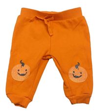 Oranžové tepláky s dýněmi zn. Primark
