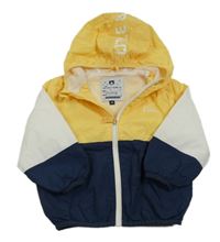 Žlto-bielo-tmavomodrá šušťáková jarná bunda s kpaucí C&A