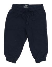 Tmavomodré tepláky H&M