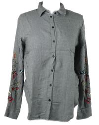 Dámska čierno-biela vzorovaná blúzka s výšivkou H&M