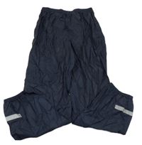 Tmavomodré šušťákové nepromokavé nohavice TCM