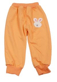 Neónově oranžové tepláky s králikom