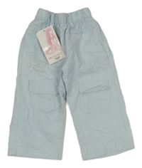 Nové - Světlemodré plátěné kalhoty s výšivkami a kapsami