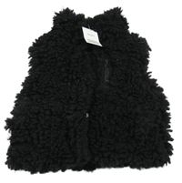 Nové - Čierna huňatá podšitá vesta Next