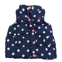 Tmavomodro-biela bodkovaná á prešívaná šušťáková zateplená vesta Jojo Maman Bébé
