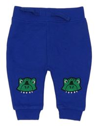 Zafírové tepláky s dinosaurami zn. St. Bernard