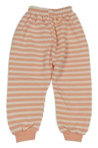 Meruňkovo-bílé pruhované tepláky 