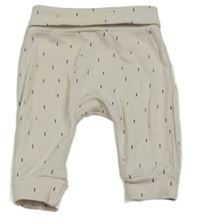 Bílé vzorované baggy tepláky H&M