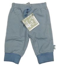 Nové - Světlemodro-bílé pruhované tepláky Ladybird