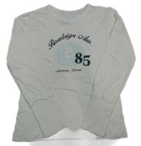 Biele tričko s nápisom a číslom