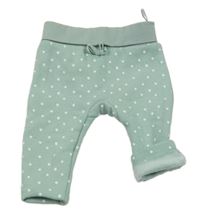 Zeleno-bílé puntíkaté zateplené tepláky C&A