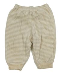 Smetanovo-béžové pruhované zamatové tepláky C&A