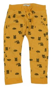 Okrové tepláky s mačkami Name it