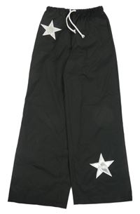 Čierne šušťákové nohavice s hviezdou