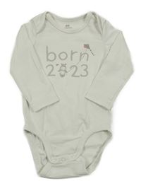 Smotanové body s nápisom a hrochem H&M