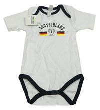Bílé body s nápisem - Deutschland C&A