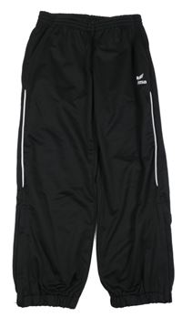 Černé sportovní tepláky s proužkem Erima