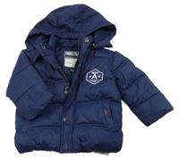 Tmavomodrá prošívaná šusťáková zimní bunda s nášivkou a odepínací kapucí FREESTYLE