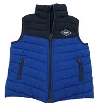 Tmavomodro-modrá prošívaná šusťáková zateplená vesta s nášivkou Joules
