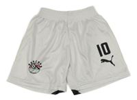 Bílé sportovní tepláky s číslem 