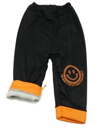 Čierno-oranžové zateplené tepláky so smajlíkom