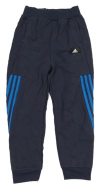 Tmavomodré tepláky s logem Adidas