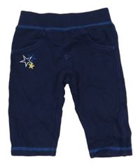 Tmavomodré tepláky s výšivkou Lupilu