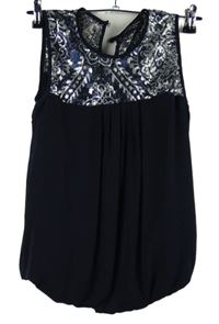 Dámska tmavomodrá balonová blúzka so striebornymi flitre