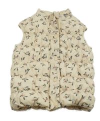 Béžová šušťáková zateplená vesta s bobulemi Manor