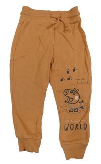 Béžovooranžové tepláky s Tomíkem George 