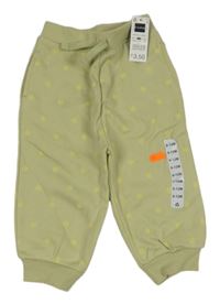 Nové - Světlekhaki tepláky s kytičkami Dunnes