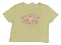 Svetložlté crop tričko so Snoopym H&M