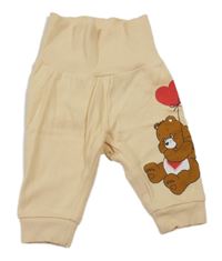 Béžové tepláky s medvídkem H&M