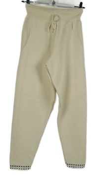 Dásmké smetanové pletené tepláky 