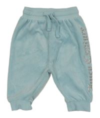 Světlemodré sametové tepláky s logem JUICY COUTURE