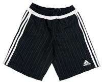 Černé šusťákové kraťasy s pruhy a logem Adidas