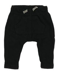 Černé baggy tepláky Hema 