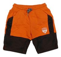 Oranžovo-černé teplákové kraťasy s nápisem Kiabi