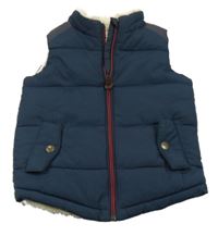 Tmavomodrá šusťáková zateplená vesta Next