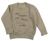 Béžová tepláková mikina s nápismi a dýněmi