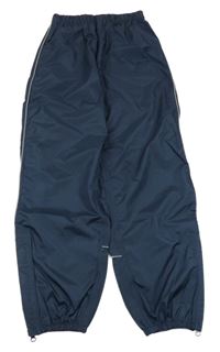 Tmavomodré šusťákové nepromokavé kalhoty TCM
