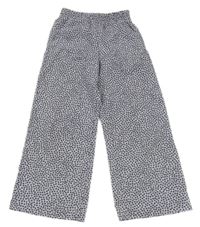 Světlerůžovo-černé kytičkované volné kalhoty H&M