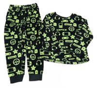 Černo-světlezelené plyšové pyžamo s ovladači a sluchátky a hvězdičkami Matalan