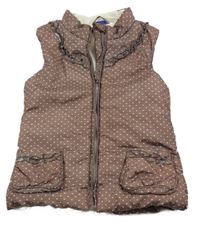 Hnedá bodkovaná á šušťáková zateplená vesta s volánikmi Lupilu